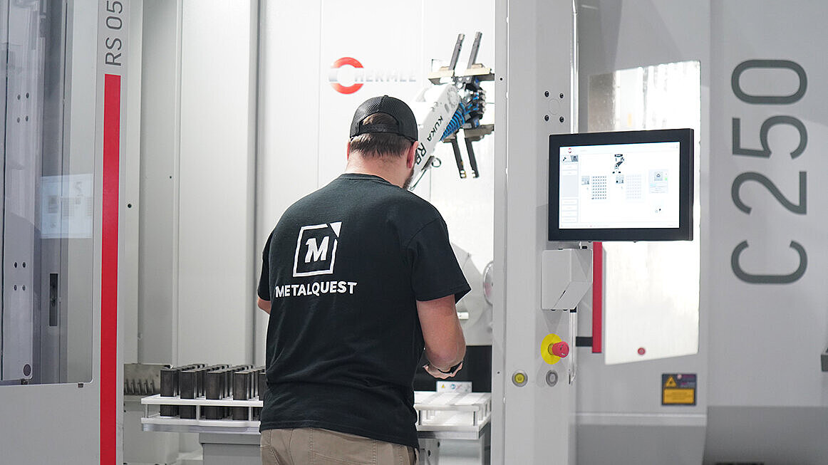 MetalQuest Unlimited loads aluminum and steel stock parts into their HERMLE RS 05-2 Robot Cell before production begins.