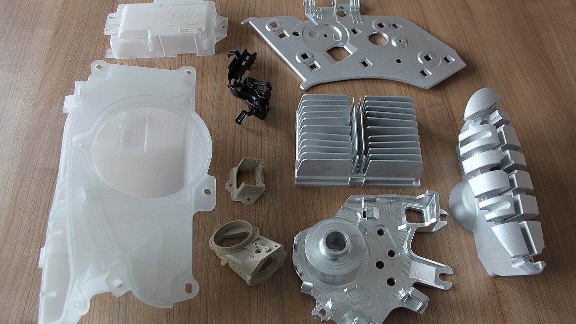 A small selection of challenging functionally integrated workpieces made of plastic (polycarbonate), aluminium and special materials from Schütz GmbH