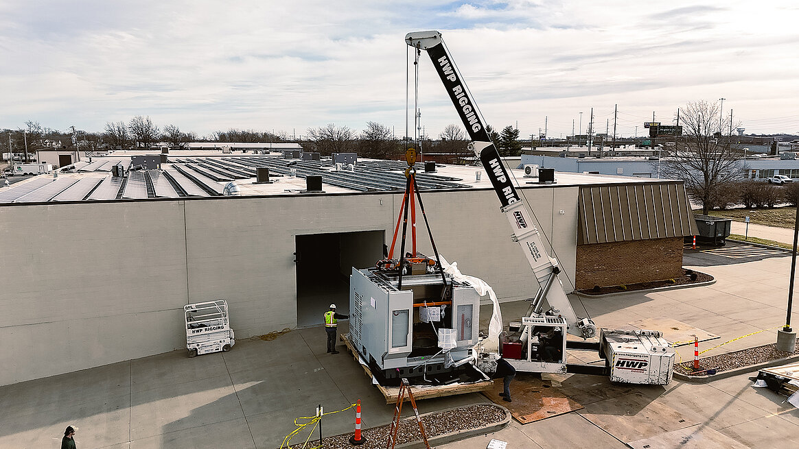 Seyer Industries works with HWP Rigging to unload their latest HERMLE C 62 5-axis machine at their facility in St. Peters, Missouri.
