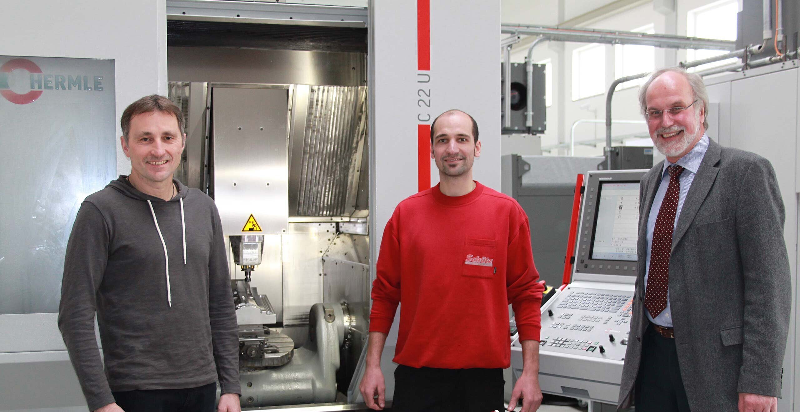 Reinhard Schütz, founder and owner of Schütz GmbH, Franz Baier, Machine Operator, CNC machining centres and Manfred Moser HPV GmbH